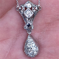 Antique white gold , diamonds and sapphire pendent, circa 1930. Nobel Antique jewelry Store, Santa Monica. Made in America.